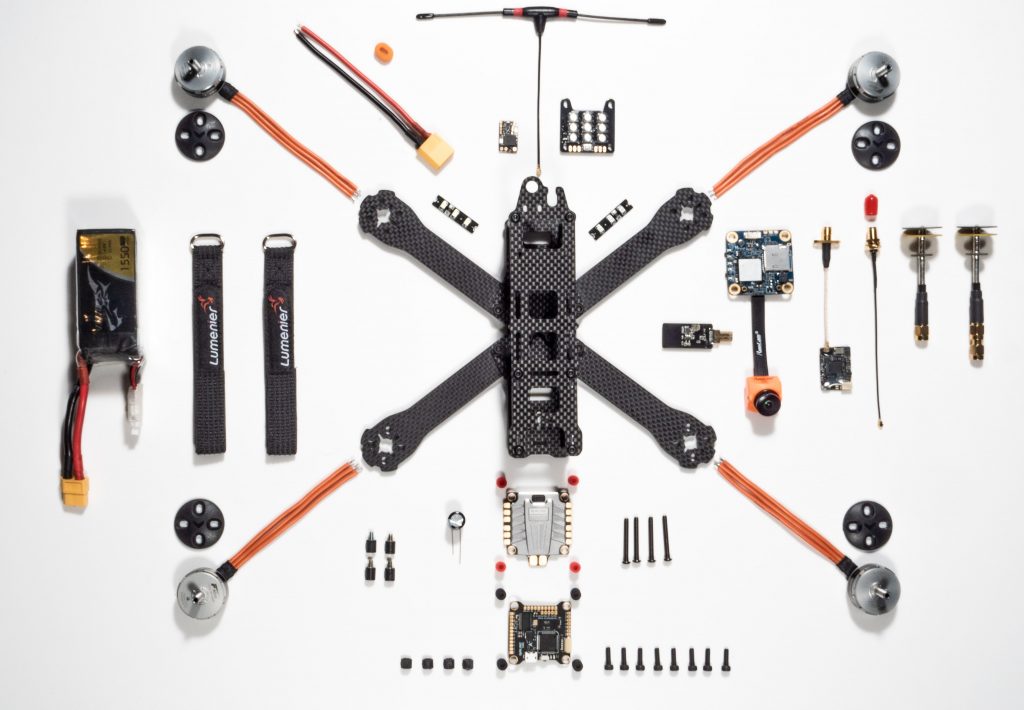 electronic components organized into the shape of a drone