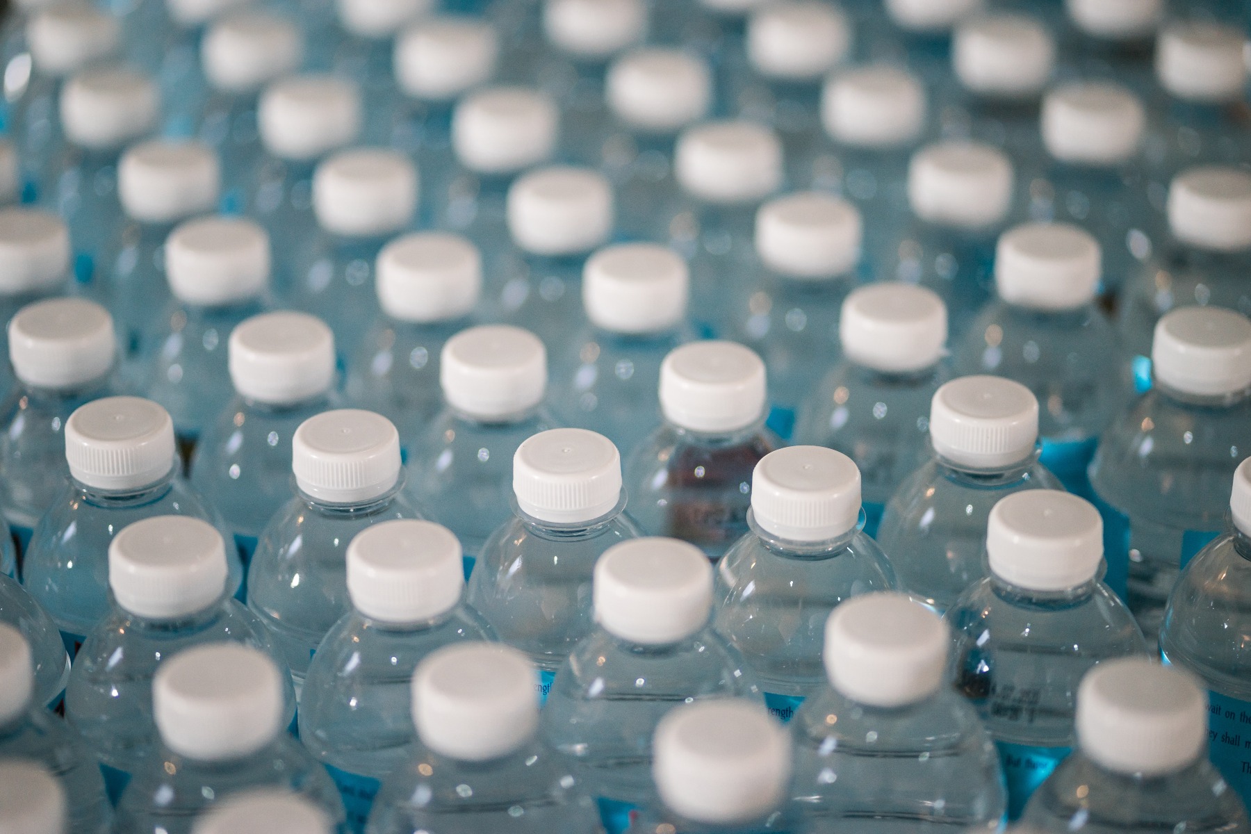 rows of single use plastic water bottles